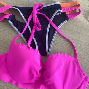 Victoria’s Secret Pink bikini top and multi colored bottoms